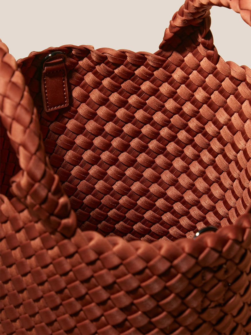 Close-up view of a Naghedi St. Barths Small Tote in Solid Adobe showing texture detail.