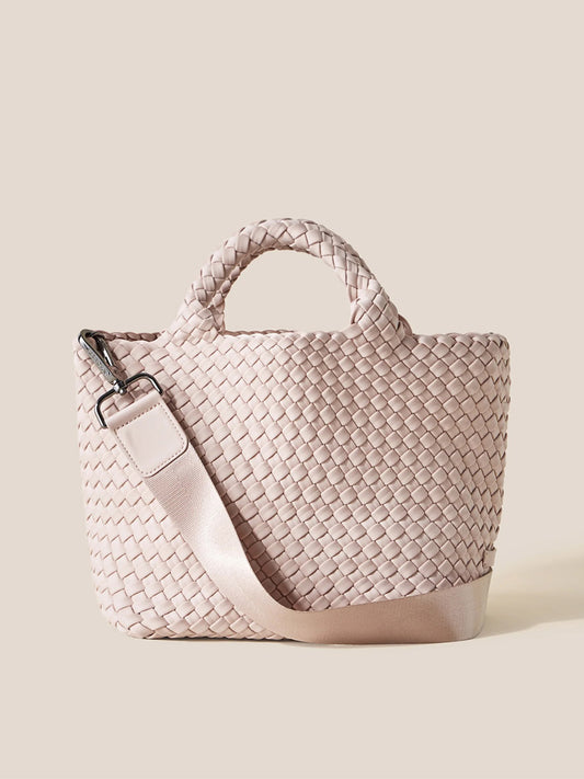 Naghedi St. Barths Small Tote in Solid Shell Pink with cross-body strap against a neutral background.