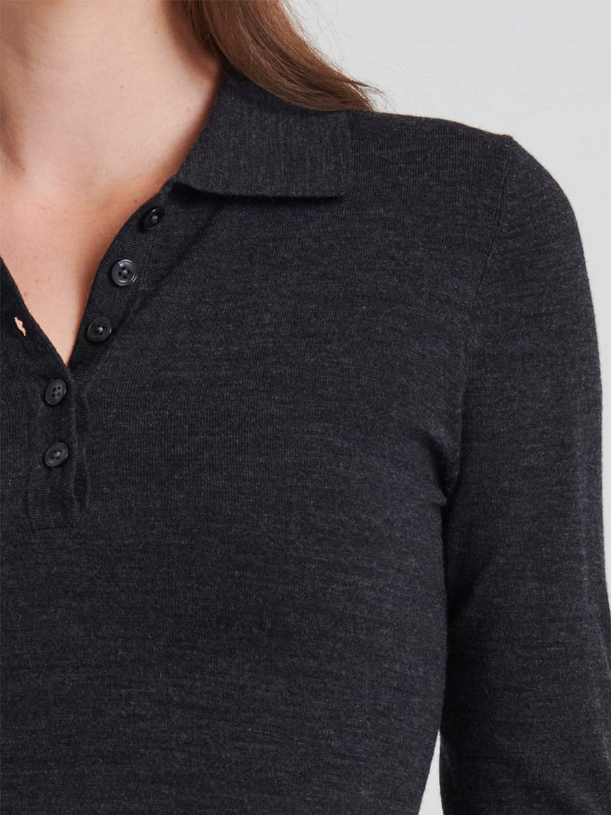 Close-up of a person wearing the Patrick Assaraf Superfine Merino Fitted Polo in Coal Melange, focusing on the shoulder and upper chest area, highlighting its slim silhouette.