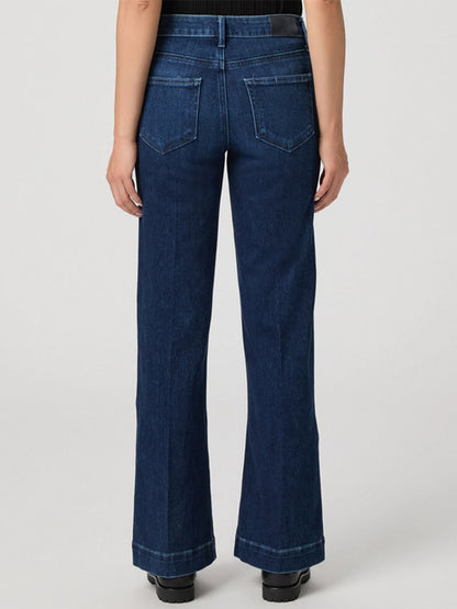 Model wears the Paige Leenah Petite Wide Leg Jean in Praline, shown from the back against a plain light background.