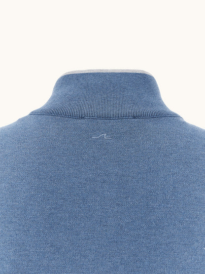 Close-up of the back collar of the Paul & Shark Half‑Zip Sweater With Aqualeather Suede Details in Colony Blue, regular fit, featuring a subtle center logo.