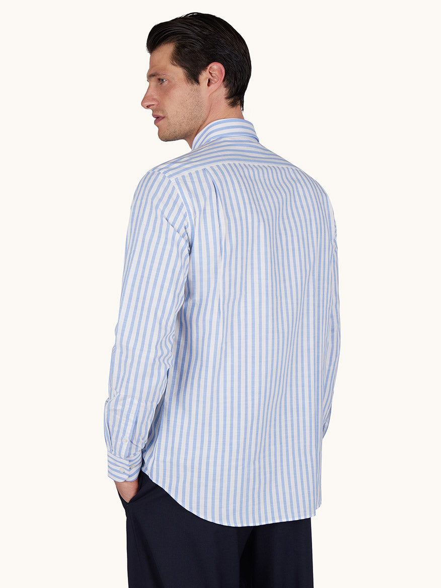 Man wearing the Paul & Shark Cotton Poplin Shirt with a white/blue striped pattern and button-down collar, viewed from the back, paired with dark pants against a plain background.