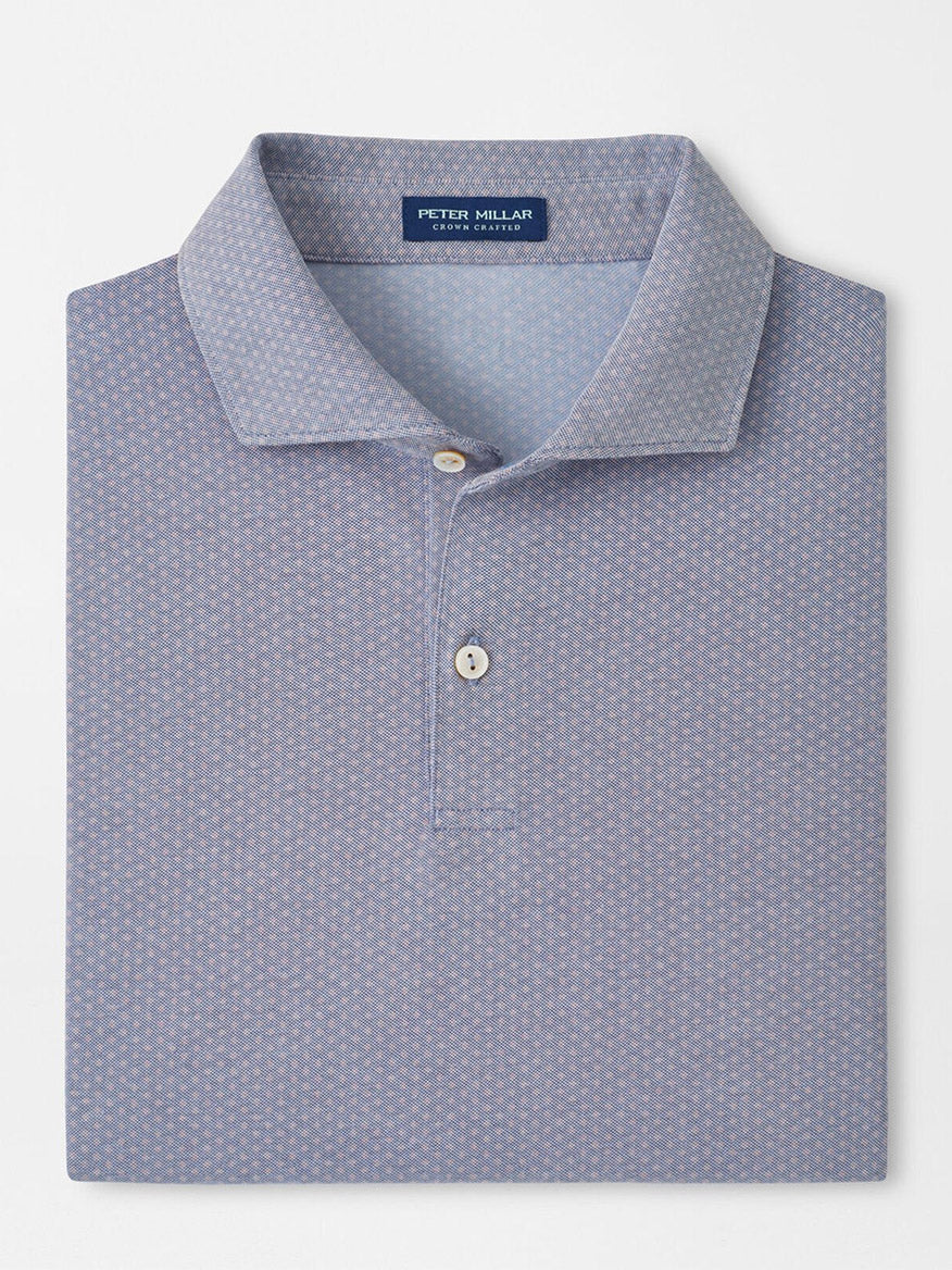 A folded Peter Millar Albatross Diamond Cotton-Blend Piqué Polo in navy, featuring a subtle geometric pattern and two buttons, displayed on a plain background.