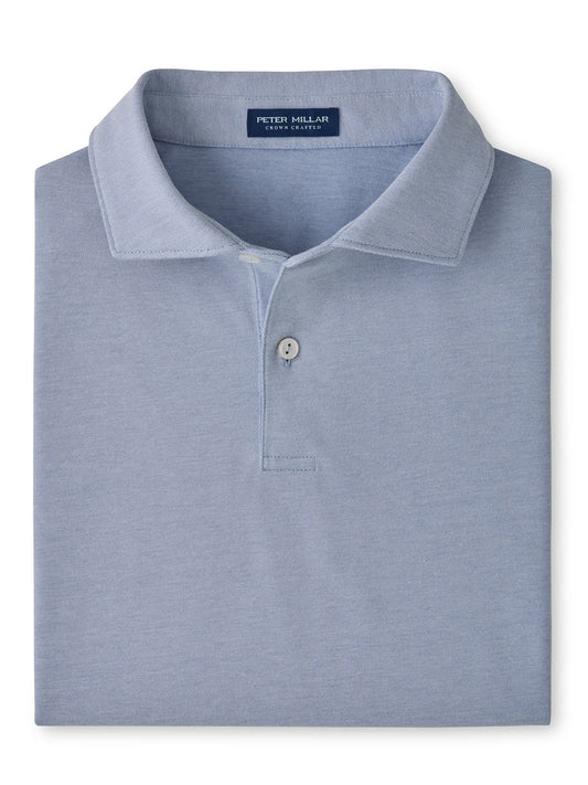 A Peter Millar Albatross Cotton-Blend Piqué Polo with an Edwin spread collar in Windy Blue, neatly folded and displayed on a white background.