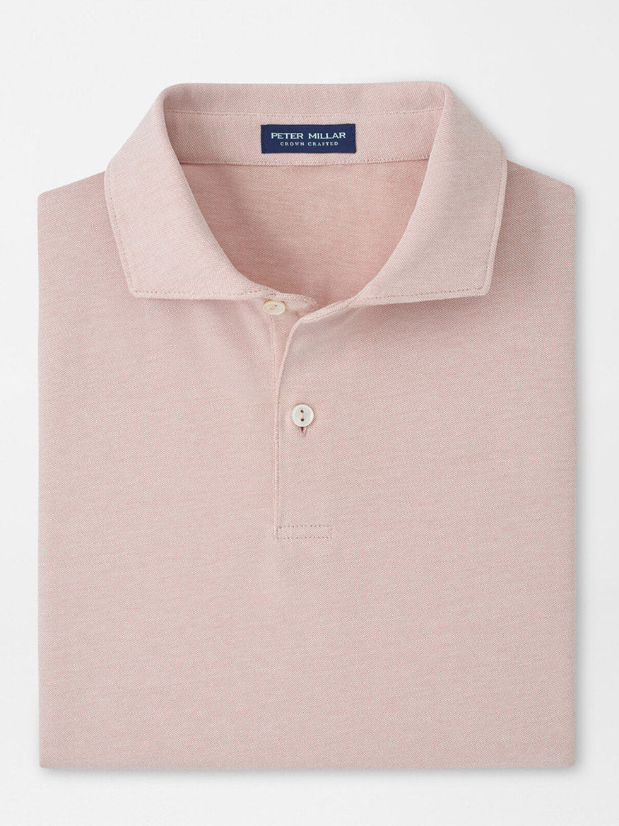 The Peter Millar Albatross Cotton Blend Piqué Polo in Faded Scarlet features a classic piqué texture and comes folded in a soft cotton blend.