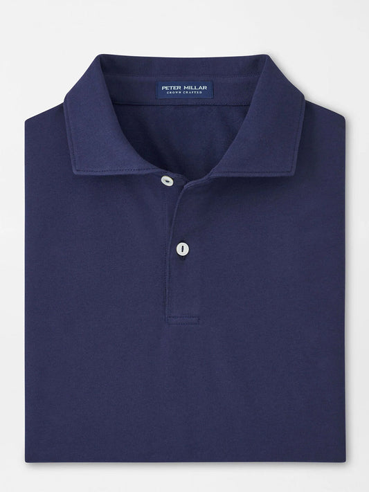 The Peter Millar Albatross Cotton Blend Piqué Polo in Navy is a neatly folded shirt featuring a classic collar, two buttons, and the signature "Peter Millar" label inside the neckline.