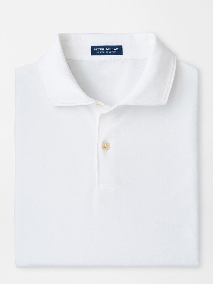The Peter Millar Albatross Cotton Blend Piqué Polo in White is a short-sleeve polo with a pointed collar, single visible button, and features a navy Peter Millar label inside the collar.