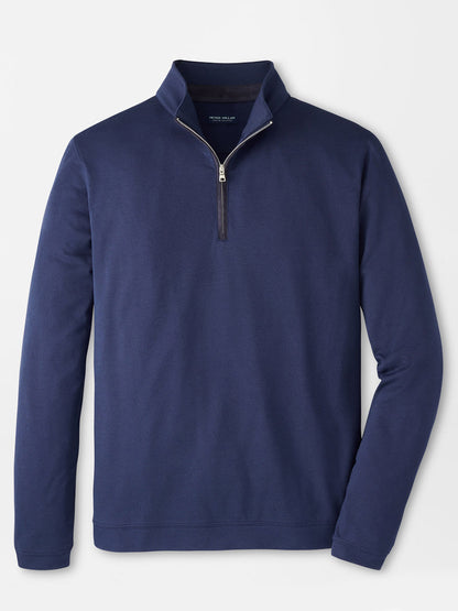 The Peter Millar Albatross Cotton-Blend Piqué Quarter-Zip in Navy features a stand-up collar and long sleeves, crafted from textured piqué fabric, and is displayed laid flat on a white background.