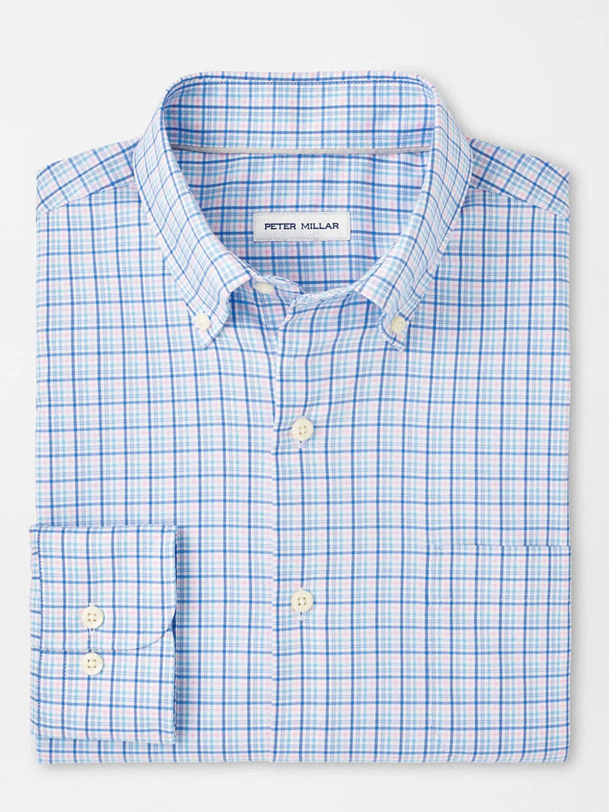 The Peter Millar Albert Crown Lite Cotton-Stretch Sport Shirt in Blue Poppy is crafted from easy-care fabric, featuring a folded design with a buttoned collar and cuffs for a classic fit.