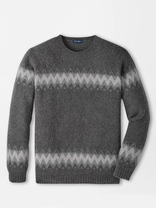 Peter Millar Après-Ski Crewneck Sweater in Fossil, a grey Merino cashmere crewneck with a charcoal and light grey zigzag pattern across the chest and cuffs.