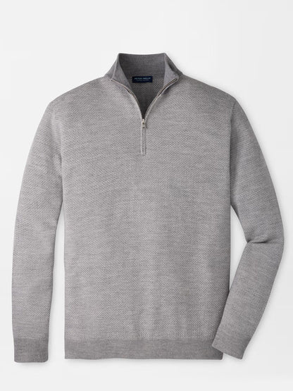 The Peter Millar Ashland Quarter-Zip Sweater in Gale Grey, a midweight pullover with a tailored fit, is shown laid flat against a white background.