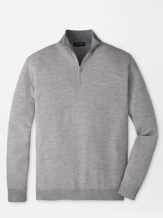 The Peter Millar Ashland Quarter-Zip Sweater in Gale Grey, a midweight pullover with a tailored fit, is shown laid flat against a white background.