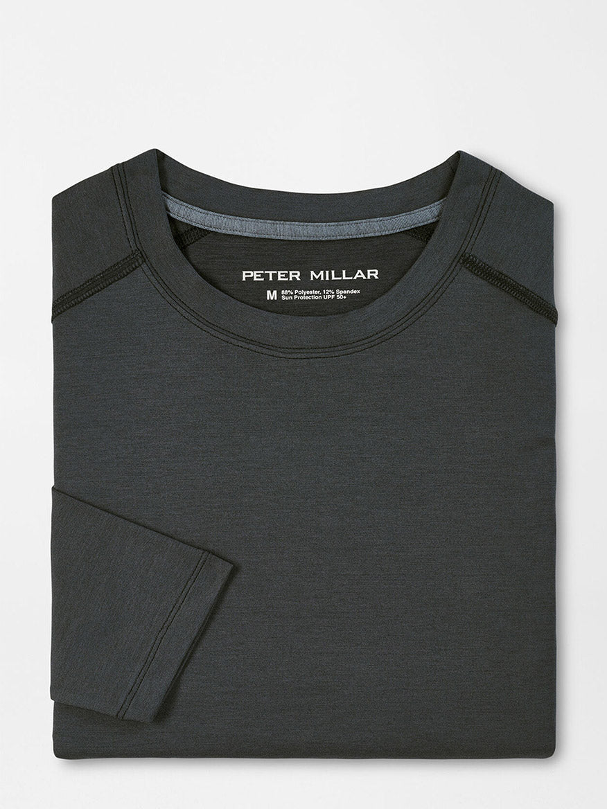 Folded black Peter Millar Aurora Performance Long-Sleeve T-Shirt with UPF 50+ sun protection and visible brand label.