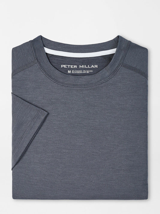 A neatly folded gray men's UPF 50+ Peter Millar Aurora Performance T-Shirt in Iron with a visible brand label at the neckline.