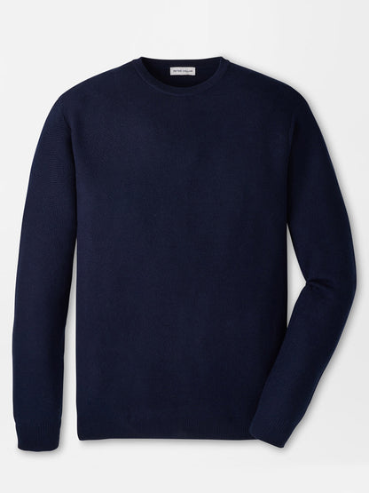 The Peter Millar Autumn Crest Honeycomb Crewneck Sweater in Navy, featuring long sleeves and a classic fit, is laid flat on a white background.