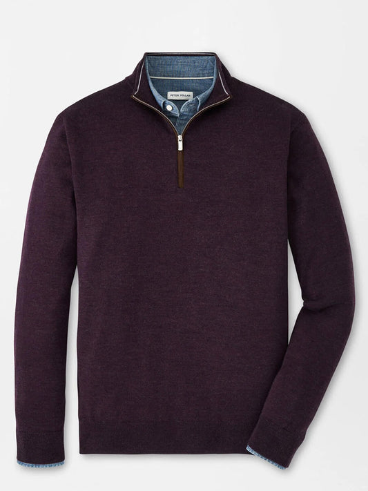 The Peter Millar Autumn Crest Suede Trim Quarter-Zip in Midnight Grape is layered over a blue button-down shirt and displayed against a plain white background.