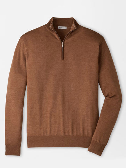Peter Millar Autumn Crest Suede Trim Quarter-Zip in Dark Amber laid flat against a white background, featuring long sleeves, a visible collar tag, and a classic fit.