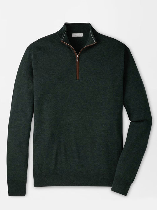 Peter Millar Autumn Crest Suede Trim Quarter-Zip in Pine Brook, a dark green Merino sweater in a classic fit, features a quarter-zip front with a brown zipper pull, long sleeves, and ribbed hem and cuffs. This lightweight sweater is displayed laid flat on a white background.