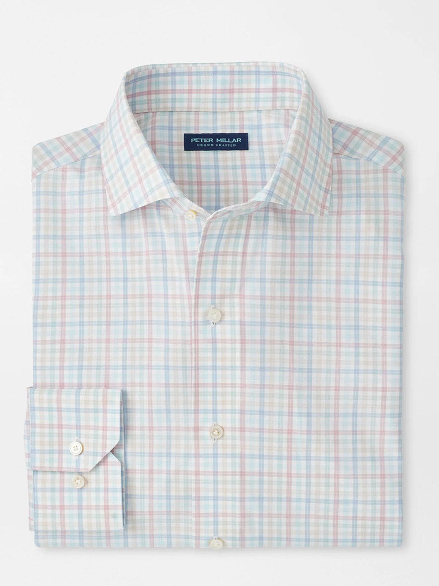 The Peter Millar Basin Performance Poplin Sport Shirt in Multi features a pastel blue, pink, and white checkered pattern with UPF 50+ fabric, shown folded on a plain background.