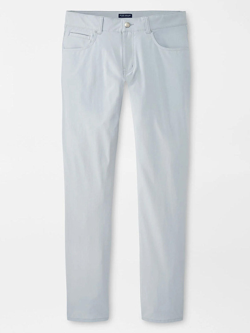 The Peter Millar Bingham Performance Five-Pocket Pant in British Grey features a slim fit, high-performance four-way stretch fabric, and front and back pockets, shown against a white background.
