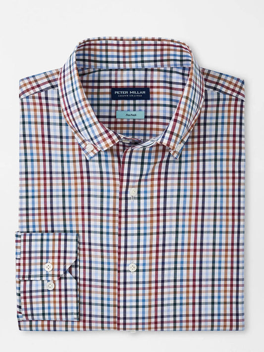 The Peter Millar Brighton Cotton Sport Shirt in Navy is a neatly folded, multicolored plaid sport shirt with a button-down collar and buttoned cuffs. It features a tailored fit and Flex Finish, displayed on a white background.