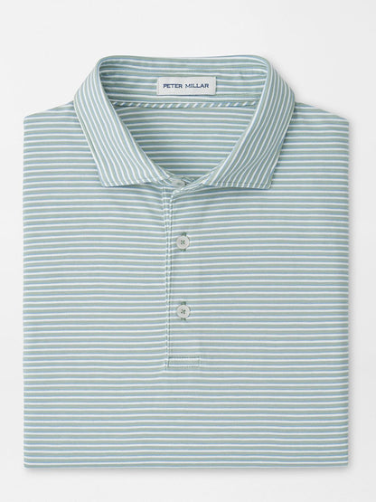 A folded Peter Millar Calvert Crown Flex Cotton Polo in Grandview, featuring a light blue color with white horizontal stripes and an inside collar label.