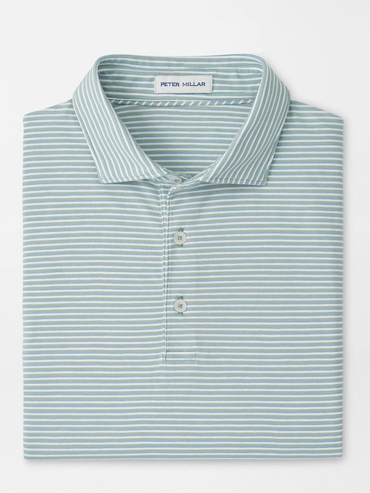 A folded Peter Millar Calvert Crown Flex Cotton Polo in Grandview, featuring a light blue color with white horizontal stripes and an inside collar label.