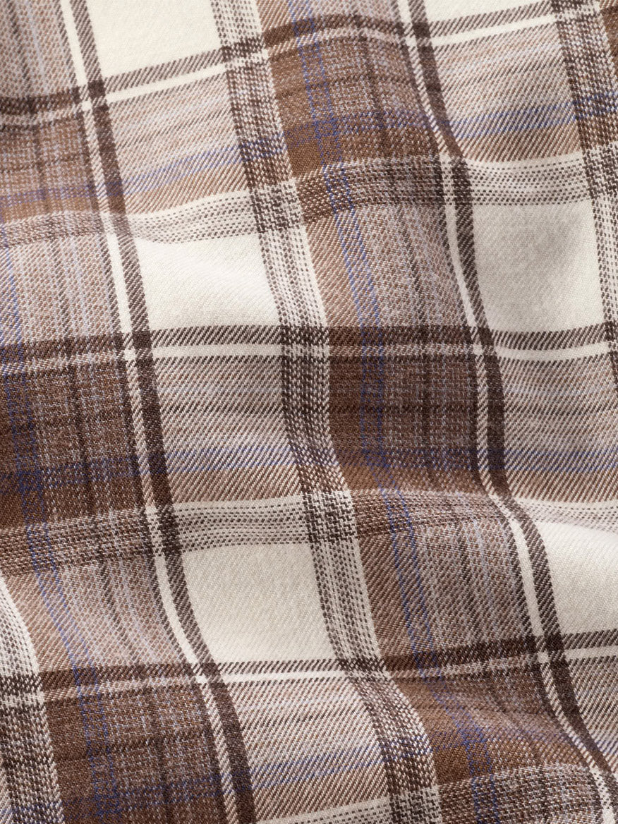Peter Millar Cannon Performance Flannel Sport Shirt in Winter Ivory with an ivory, brown, and blue plaid pattern on lightweight flannel fabric.