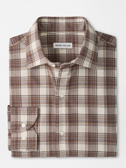 Peter Millar Cannon Performance Flannel Sport Shirt in Winter Ivory, a lightweight flannel with an ivory, brown, and tan plaid pattern, long sleeves, and a button-down front.