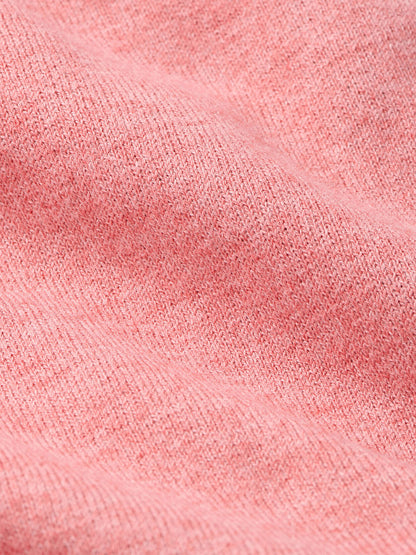 Close-up of the Peter Millar Coolspun Lite Cotton Quarter-Zip Sweater in Venetian Pink, showcasing its soft, textured knit and gentle folds, enhanced with Coolspun layers for a high-performance feel.