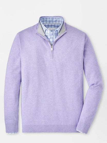 A Peter Millar Coolspun Cotton Quarter-Zip Sweater in Wildflower is stylishly layered over a blue and white plaid shirt against a plain background.