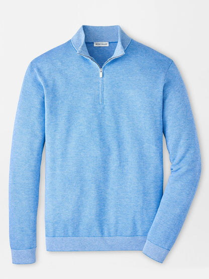 The Peter Millar Coolspun Lite Birdseye Quarter Zip Sweater in Bluebird features moisture-wicking fabric and long sleeves, shown against a white background.