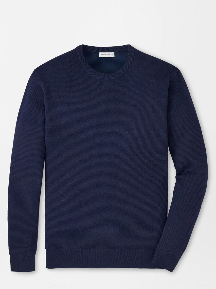 The Peter Millar Coolspun Lite Textured Crewneck Sweater in Navy is shown laid flat with long sleeves against a white background.