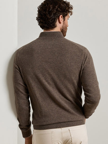 Back view of a man wearing a Peter Millar 25th Anniversary Cashmere Quarter-Zip Sweater in Sawgrass, a classic fit, brown quarter-zip sweater with ribbed cuffs and hem.