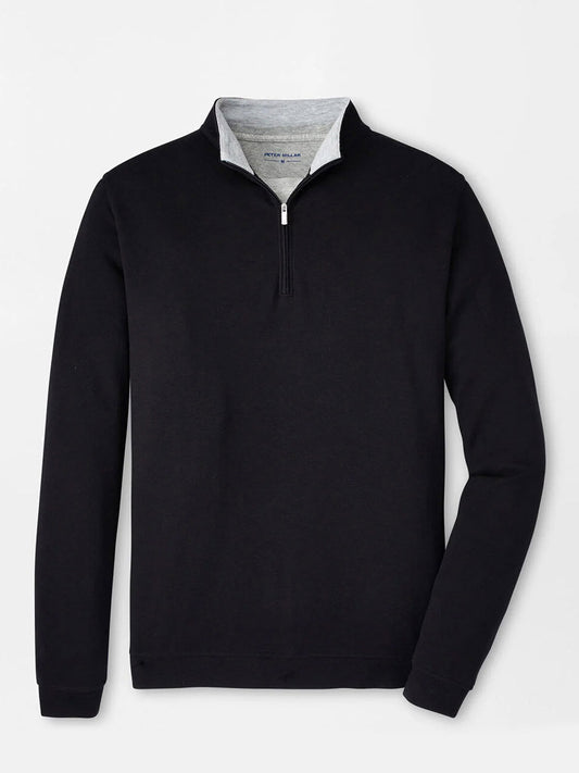 The Peter Millar Crown Comfort Pullover in Black features a light gray inner collar and four-way stretch fabric, shown against a plain white background.