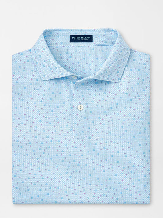 A Peter Millar Diamond In The Rough Performance Jersey Polo in Blue Frost with a patterned design, folded and laid flat.