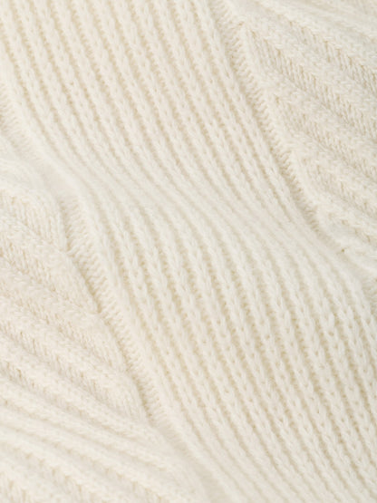 Close-up of a Peter Millar Dolomite Crewneck Sweater in Almond, an off-white, tailored-fit Merino-cashmere sweater in a ribbed knit.
