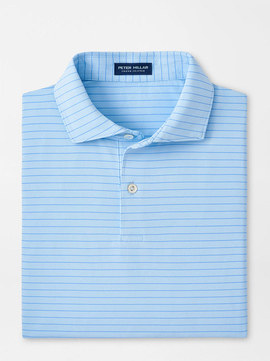 A light blue striped Peter Millar Duet Performance Jersey Polo in Blue Frost neatly folded with the collar visible.