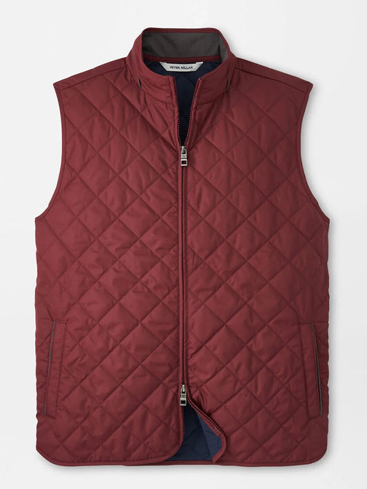 The Peter Millar Essex Vest in Autumn Foliage is a sleeveless maroon quilted vest with a front zipper, two side pockets, and a standing collar, shown flat on a white background.