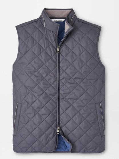 The Peter Millar Essex Vest in Iron, featuring a quilted design, front zipper, stand collar, and two zippered side pockets, is displayed flat against a neutral background.