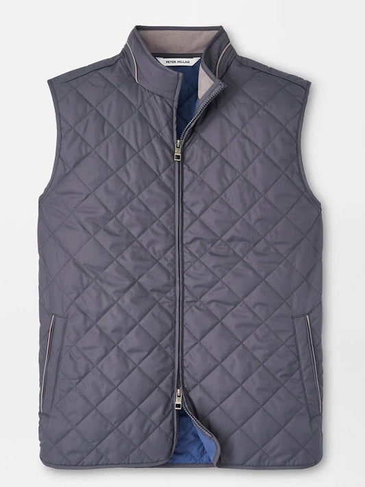 The Peter Millar Essex Vest in Iron, featuring a quilted design, front zipper, stand collar, and two zippered side pockets, is displayed flat against a neutral background.