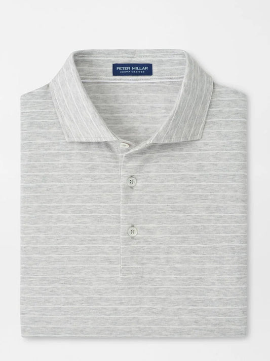 The Peter Millar Excursionist Flex Striped Polo in British Grey is a short-sleeve light grey polo with subtle stripes, crafted from soft cotton jersey, featuring a two-button placket and "Peter Millar" label inside the collar.