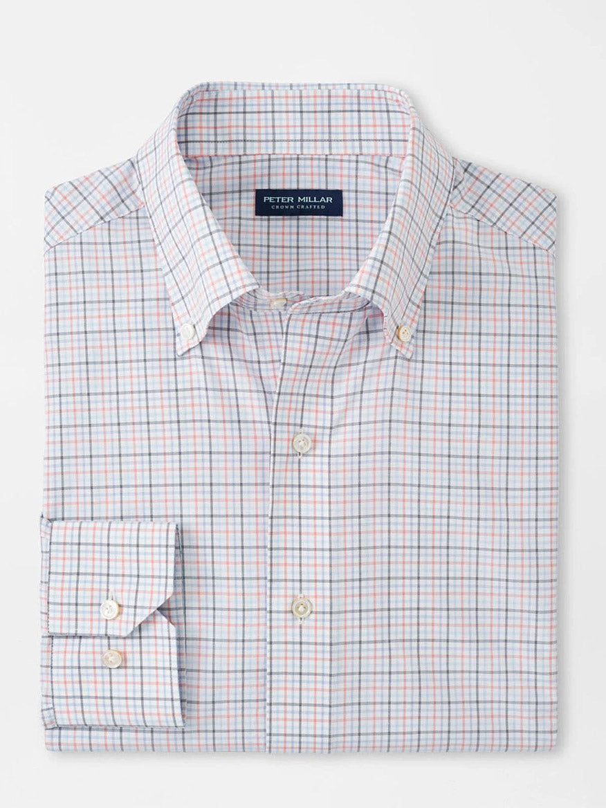 The Peter Millar Getz Performance Poplin Sport Shirt in Navy has a folded checkered pattern, an inside collar label, and features a button-down collar. Designed with buttoned cuffs, it provides performance fabrication for comfort and UPF 50+ sun protection.