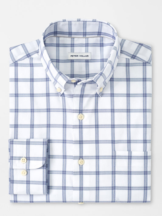 A folded blue and white plaid Peter Millar Gorham Crown Lite Cotton-Stretch sport shirt.