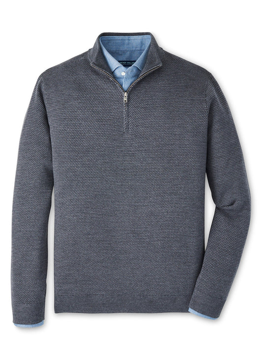 The Peter Millar Keene Quarter-Zip Sweater in Charcoal, featuring a tailored fit, is layered over a light blue collared shirt and displayed against a white background.