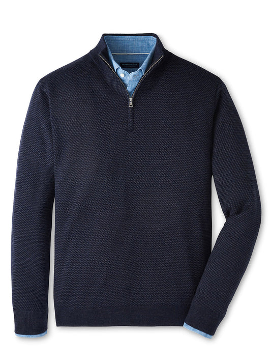 The Peter Millar Keene Quarter-Zip Sweater in Navy, a midweight tailored-fit style, is layered over a light blue collared shirt and displayed on a plain white background.