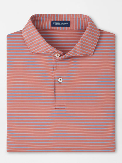 The Peter Millar Keynote Performance Jersey Polo in Faded Scarlet features white stripes, a two-button placket, four-way stretch comfort, and UPF 50+ sun protection.