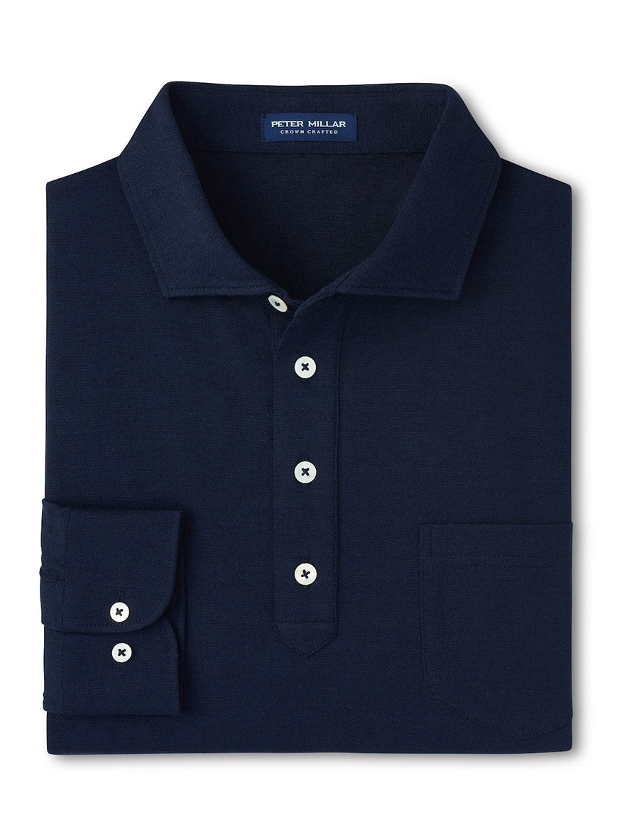 The Peter Millar Landon Long Sleeve Polo in Navy features a spread collar, white buttons, chest pocket, and visible label inside the collar. It's crafted from a cotton-linen blend for comfort and style.
