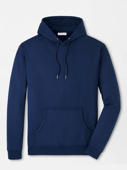 The Peter Millar Lava Wash Hoodie in Navy features a fleeced interior, front pocket, and drawstrings, shown on a plain light background.