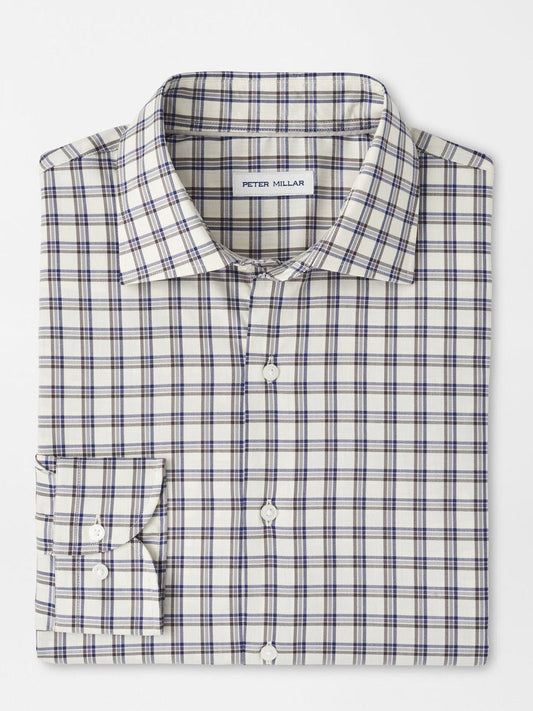 A Peter Millar Lenox Crown Lite Cotton-Stretch Sport Shirt in Winter Ivory with blue and brown plaid on white, neatly folded, long-sleeve, button-up style and a visible “Peter Millar” label inside the collar.